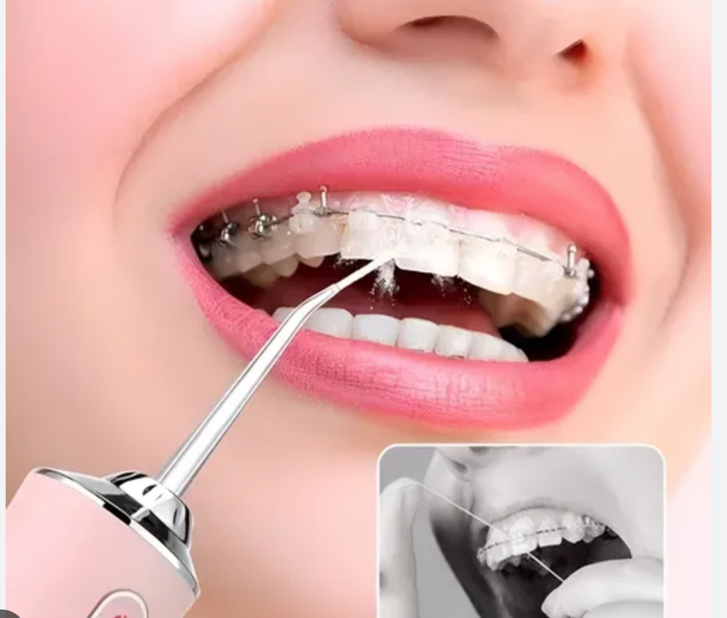 IRRIGADOR DENTAL